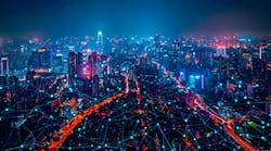 Futuristic smart city with digital connectivity and network overlay at night Futuristic smart city with digital connectivity and network overlay at night