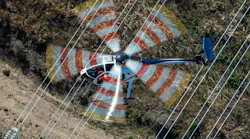 Avoiding structures and power lines during aerial work requires a distraction-free environment.