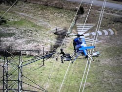 Helicopters perform various construction and maintenance activities within shielded areas. Helicopters perform various construction and maintenance activities within shielded areas.