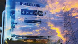 Electric power meter measuring power usage with High voltage post Electric power meter measuring power usage with High voltage post