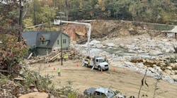 Duke Energy contractors work to get the backbone feeder up in Chimney Rock, Norh Carolina. Duke Energy contractors work to get the backbone feeder up in Chimney Rock, Norh Carolina.