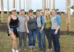 The IBEW Local 77 team of Cassie Crabtree, Cody James and Courtney Lupinek had their wives supporting them on the sidelines during their first time competing at the International Lineman’s Rodeo. The IBEW Local 77 team of Cassie Crabtree, Cody James and Courtney Lupinek had their wives supporting them on the sidelines during their first time competing at the International Lineman’s Rodeo.