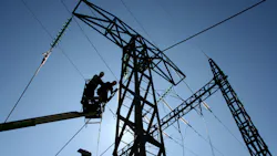 power towers with workers
