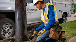 worker by pole worker by pole