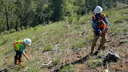 ACRT EnviroScience team members Michael Whitacre and Carlyn Rocazella establish a sampling subplot within the right-of-way to document vegetation composition during BIOaudit field assessments.
