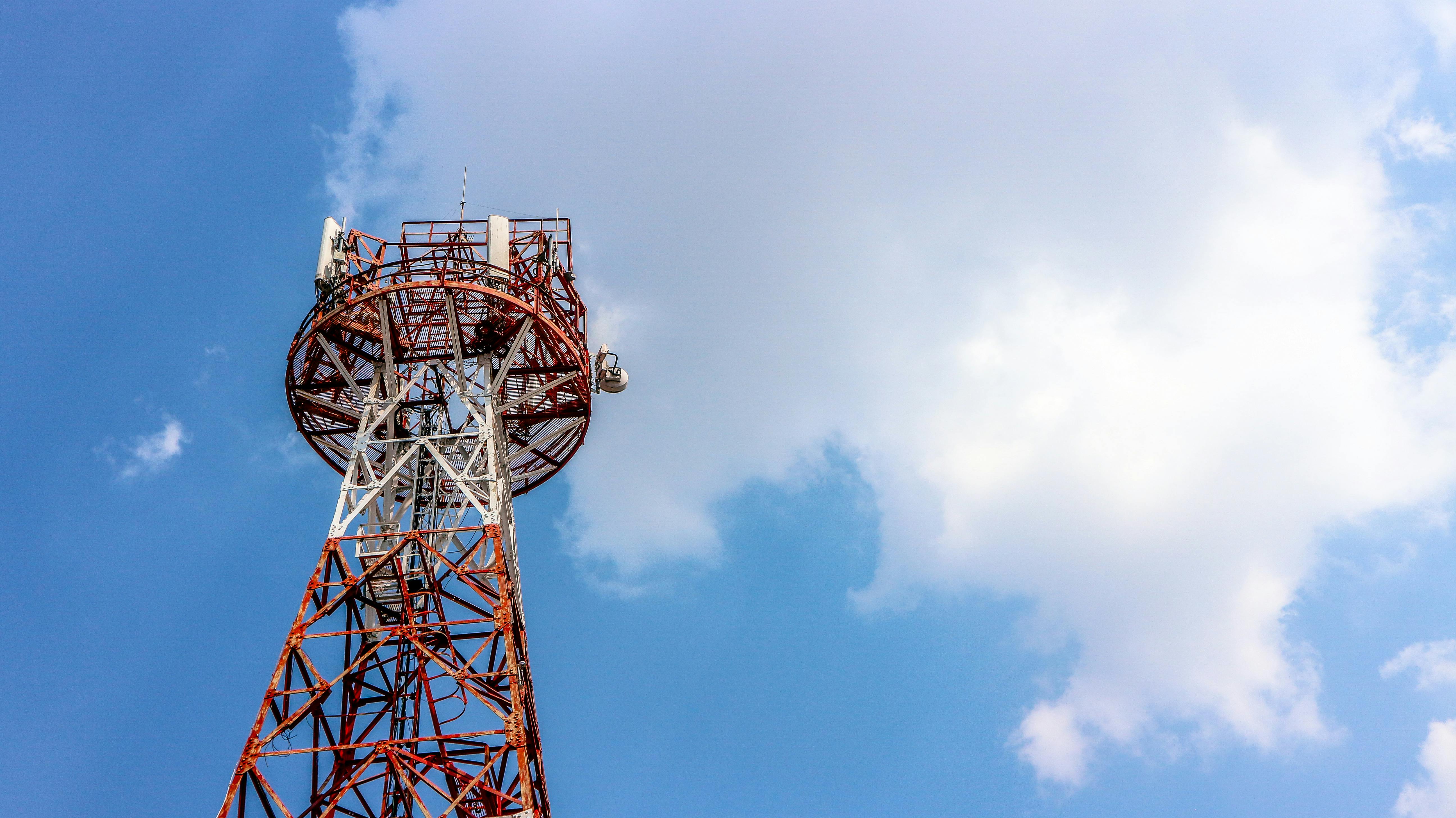 Telecommunication tower equipped with various antennas, essential for mobile communication, broadcasting, and data transmission. | Credit to: Dreamstime