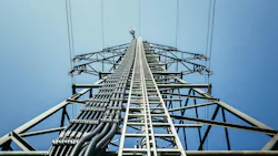 Close up of electrical tower and blue sky. Renewable energy and smart grid. Close up of electrical tower and blue sky. Renewable energy and smart grid.