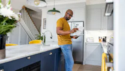 customer with bill at home customer with bill at home