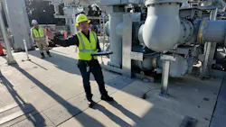Crockett gives a tour of the substation during startup testing.