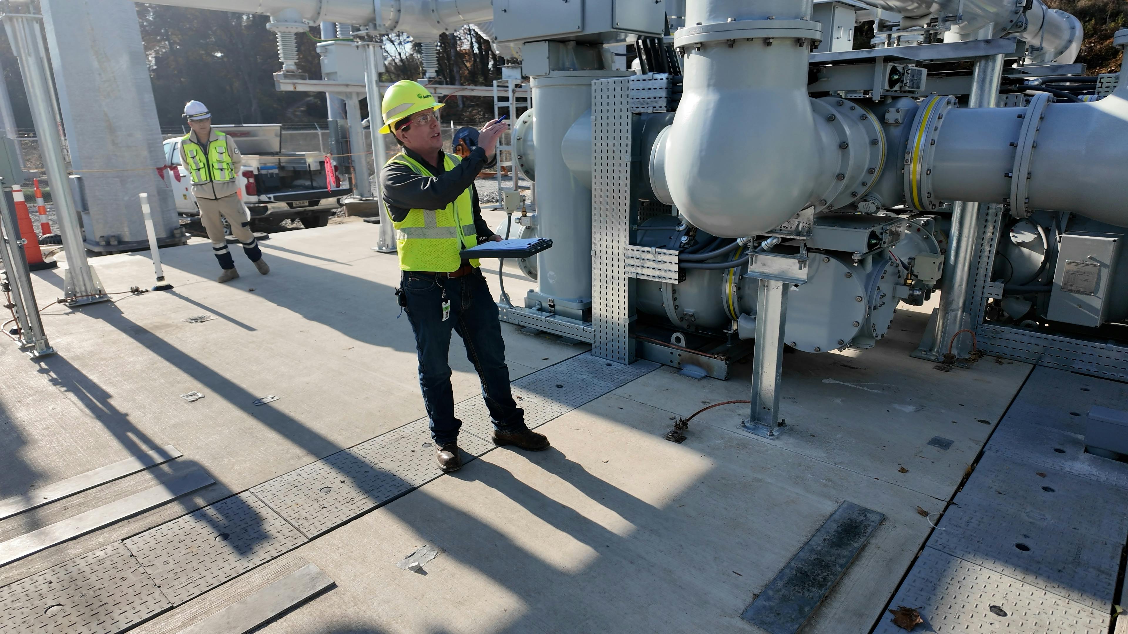 Dan Crockett examines the substation during startup testing.
