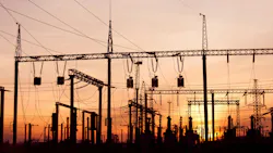 Electric substation and pylons with power lines.