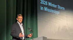 utility executive speaking at event