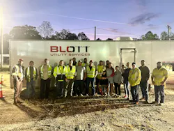 Brittany Burrell, married to Daniel, a Duke Energy lineworker, did laundry with other line wives for out-of-town crews during Hurricane Helene.