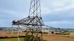 As in the United States, National Grid's lineworkers wear fall protection and high-vis workwear to keep safe in the field.