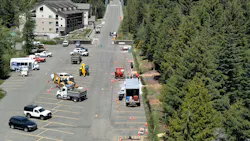 Construction crews underground distribution powerlines in Government Camp, Ore., May 20. Portland General Electric is undergrounding approximately seven miles of powerlines near Government Camp to protect Timberline, Mount Hood Meadows, Skibowl and the surrounding communities from the increasing threat of wildfire.