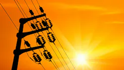 bright sunny sky behind power line