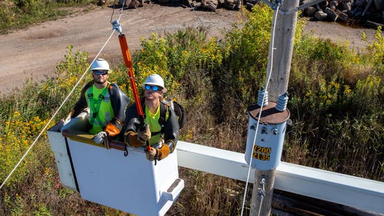 line workers restoring power