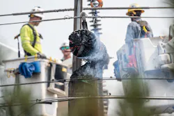 Avista Utilities electric crews make repairs to equipment damaged by wildfires in Spokane County, Washington.