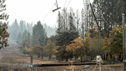 Damaged Avista Utilities electric equipment in the wake of area wildfires in Spokane County, Washington.