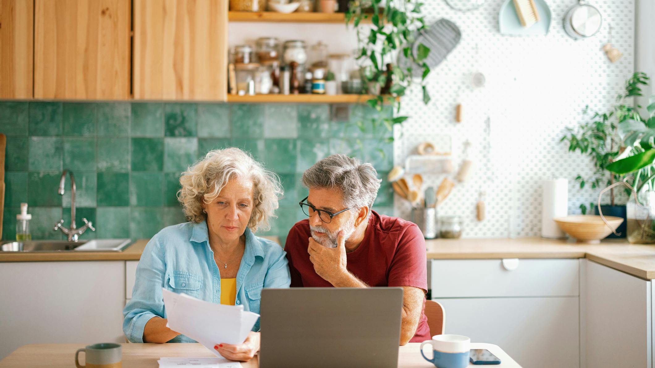 couple looking at bill at table