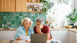 couple looking at bill at table