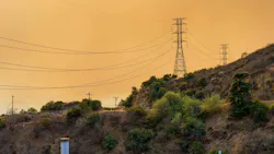 power line against smoky sky