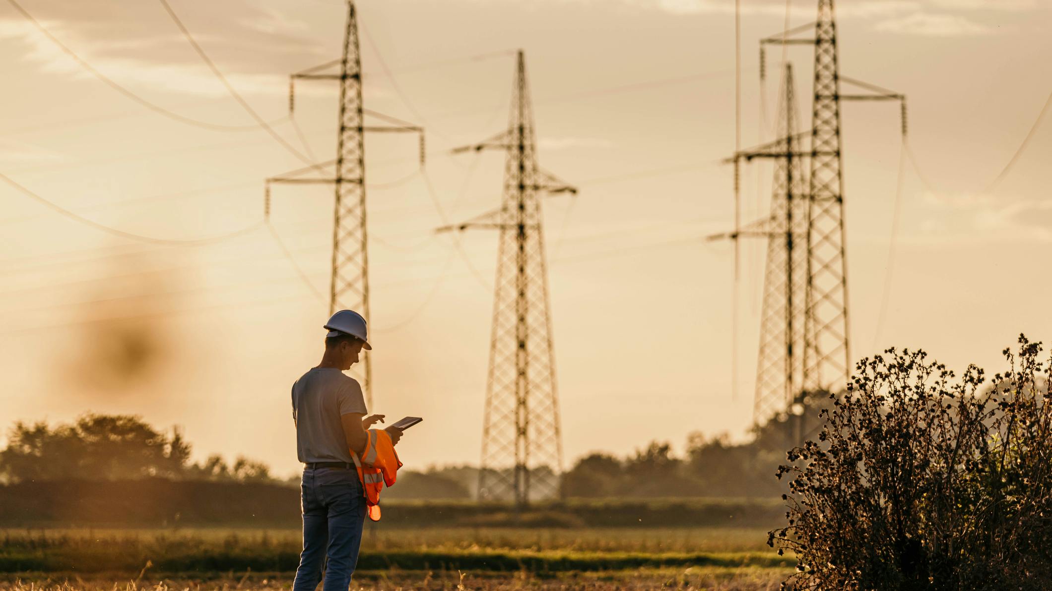 actual utility engineer or technician in the field using a tablet