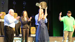 One of the winners--Adda Thomas--won the event two years in a row, and in her glittery navy dress, she proudly held up her belt as the crowd cheered.